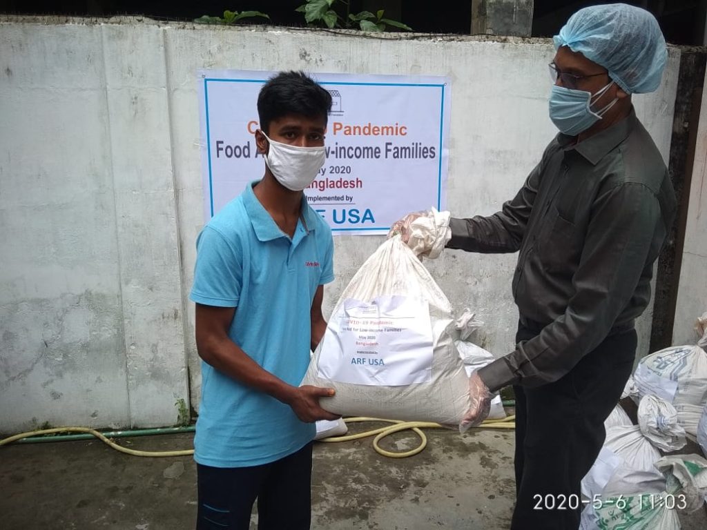 ARF USA food aid handover to a low-income family in Bangladesh during the COVID-19 pandemic